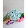 Crochet bouquet of blue flowers.