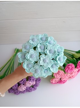 Crochet bouquet of blue flowers.