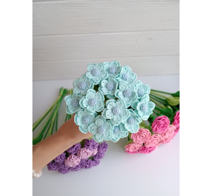 Crochet bouquet of blue flowers.