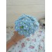 Crochet bouquet of blue flowers.