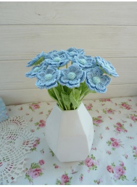 Crochet bouquet of blue flowers.