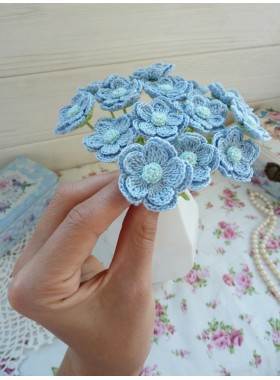 Crochet bouquet of blue flowers.