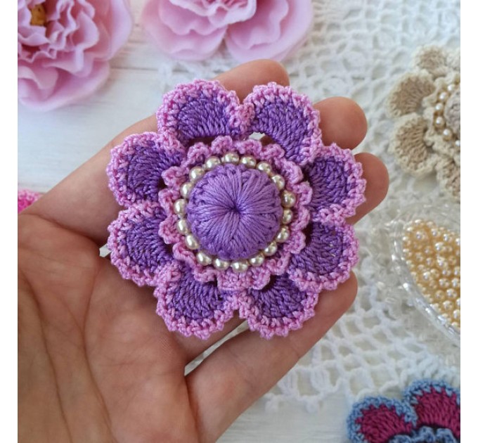 Crochet flower with pearls.