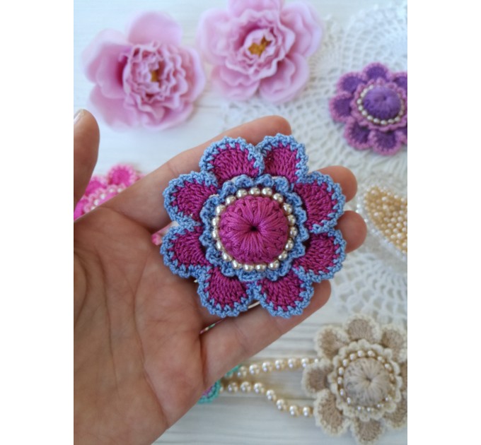 Crochet flower with pearls.