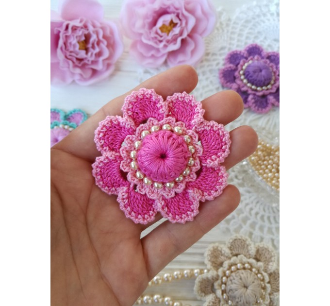 Crochet flower with pearls.