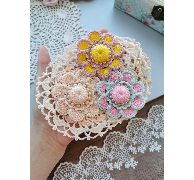 Crochet flower with pearls.