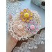 Crochet flower with pearls.