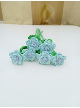 Crochet bouquet of blue flowers.