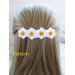 Barrette with crochet daisies.